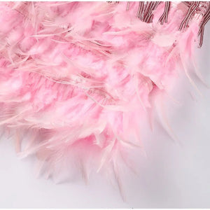 Plumelle – Luxe veren mini-jurk